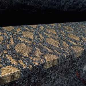 Stretch lace dress fabric, per metre - navy with metallic gold sparkle Rose design