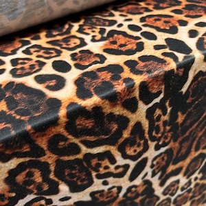 Soft handle single jersey fabric, per metre - Jaguar animal print - gold & brown