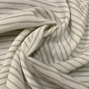 Woven crepe dress fabric, per metre -  white with distresses grey stripe