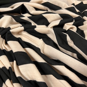Tessuto jersey morbido al tatto, al metro - a righe - nero e crema