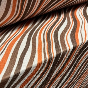 Strawcloth textured double jersey stretch spandex fabric, per metre - wave print - white orange & brown