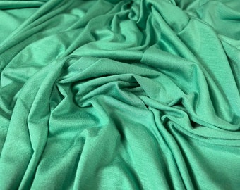 Viskos spandex stretchtyg i single jersey, per meter - enfärgad - stark mintgrön