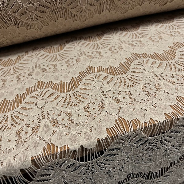 Corded lace dress fabric with scalloped frill design, per metre - stone