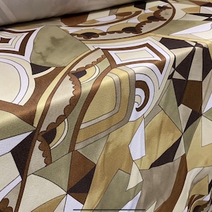 Crepe backed sateen woven dress fabric, per metre - distressed swirl print - sage gold & brown