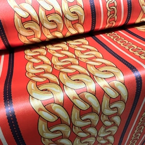 Silky Satin woven dress fabric, per metre - tartan print - designer chains print - pink & gold