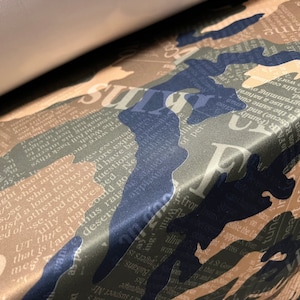 Scuba neoprene style stretch spandex double jersey fabric, per metre - camouflage newspaper headlines print