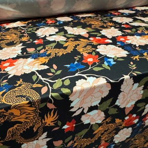 Soft touch stretch spandex jersey fabric, per metre - dragons & flowers print - multicolour