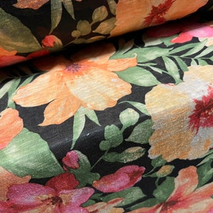 Thick & thin slubbed single jersey fashion fabric, per metre - amaryllis flower print - black and peach
