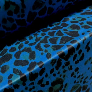 Single jersey fashion fabric - 60 inches wide - leopardskin animal print - blue & green