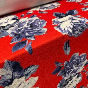 Scuba textured ‘Liverpool’ stretch spandex jersey fabric, per metre - Red with blue rose print