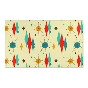 May include: A seamless pattern featuring a retro mid-century modern design with red, blue, yellow, and brown geometric shapes on a light yellow background.