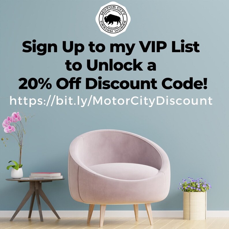 May include: A graphic with text that reads "Sign Up to my VIP List to Unlock a 20% Off Discount Code!" and a link to "https://bit.ly/MotorCityDiscount". The graphic is displayed on a light blue wall with a pink armchair, a small table with a book on it, and a potted plant with pink flowers.