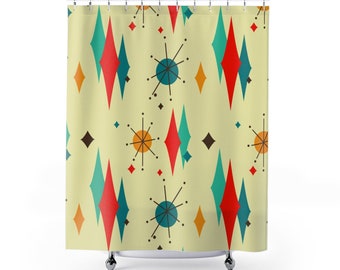 May include: A shower curtain with a retro mid-century modern design featuring a repeating pattern of teal, red, and orange diamonds and stylized starbursts on a light yellow background.