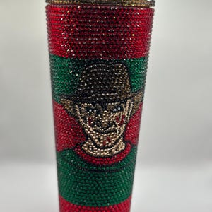 Vaso con adornos de Halloween