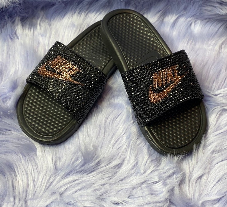 rose gold and black nike slides