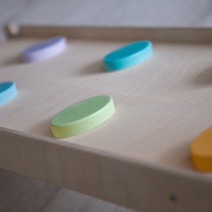 Montessori sliding/rock board.