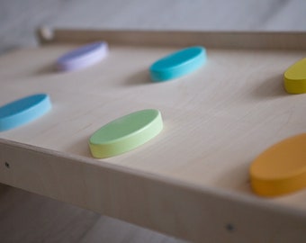 Montessori sliding/rock board.