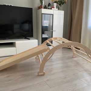 Climbing arch, rocker with ramp, sliding board