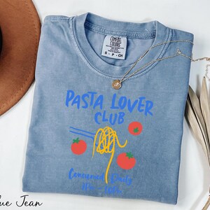 a blue tshirt with the words pasta lover club on it