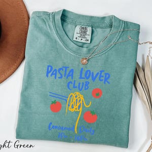 a t - shirt that says pasta lover club with tomatoes on it
