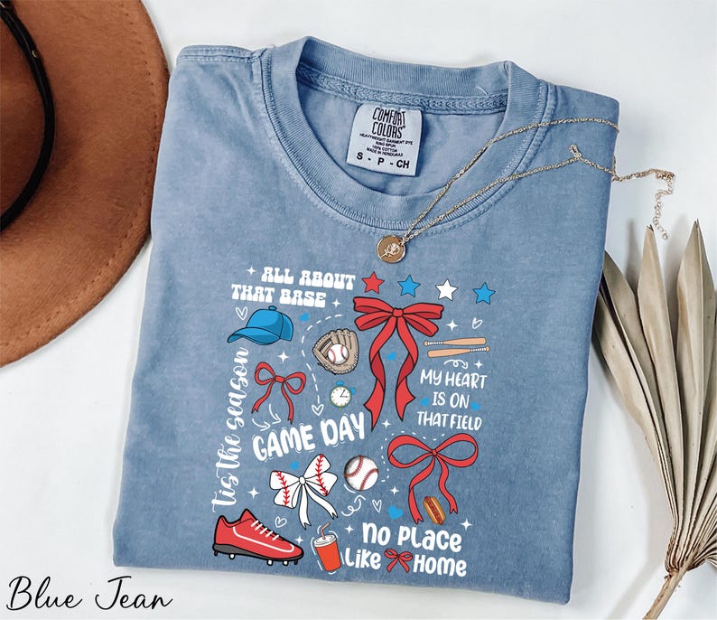 a t - shirt with a picture of a game day on it