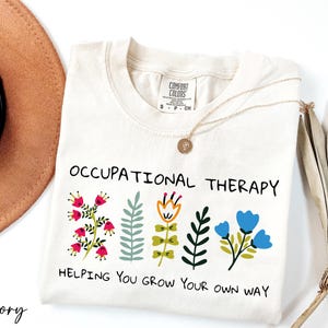 a hat, sunglasses, and a t - shirt with a message on it