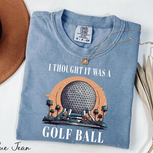 a t - shirt that says i thought it was a golf ball