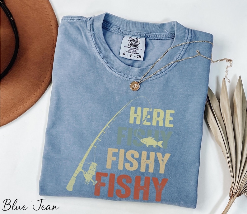 a t - shirt that says here fishy fishy