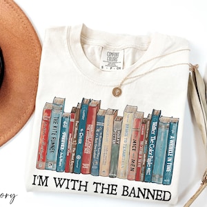 a hat and a t - shirt with books on it