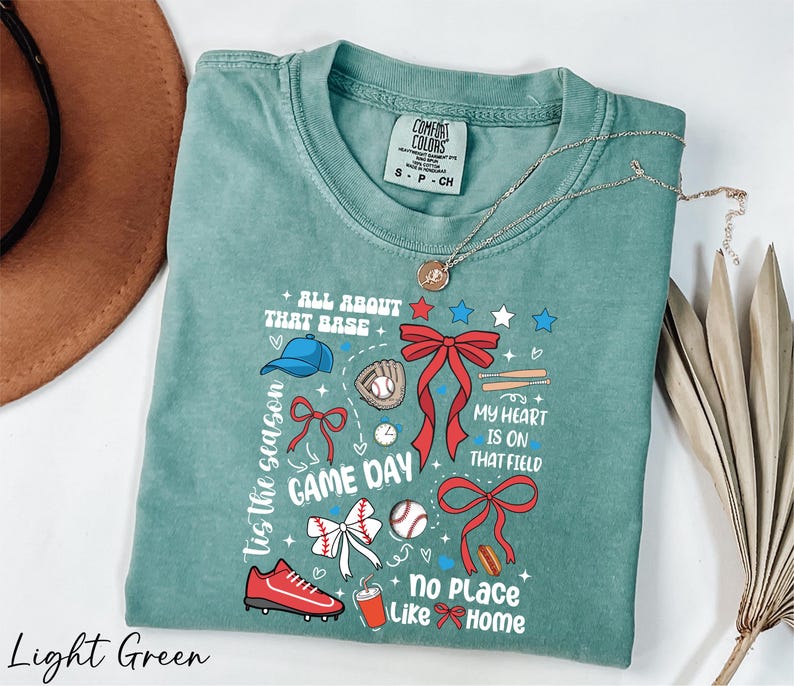 a t - shirt with a picture of a game day on it