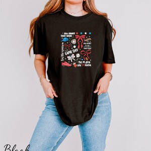 a woman wearing a black shirt and jeans