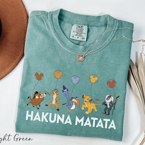 a tshirt with a picture of hakuna matata on it