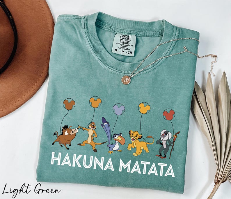 a tshirt with a picture of hakuna matata on it