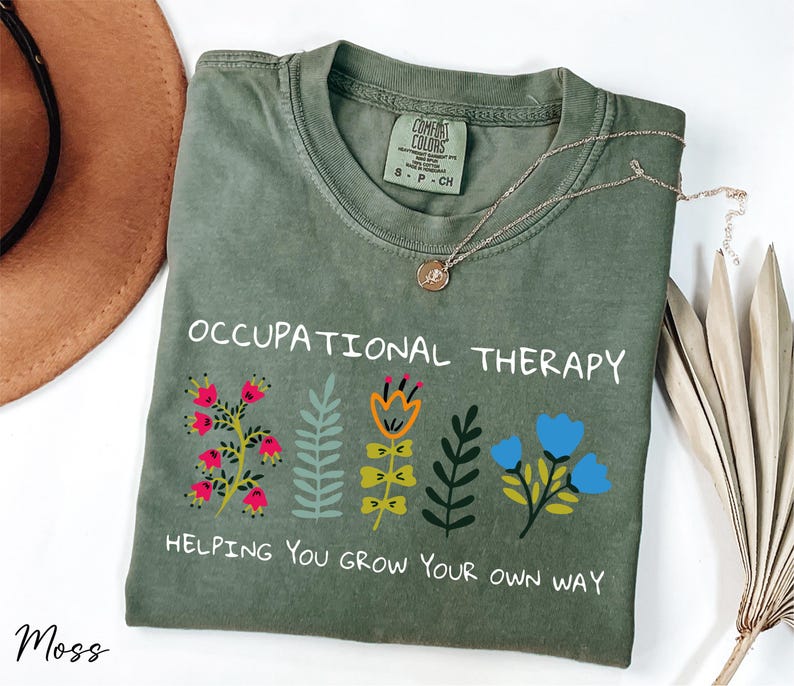 a t - shirt with a message on it and a hat next to it