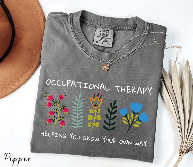 a t - shirt that says,'occupational therapy helping you