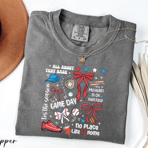a t - shirt with a hat and a feather on it