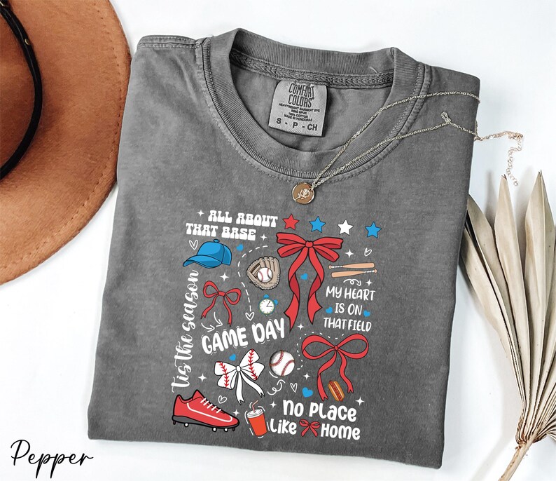 a t - shirt with a hat and a feather on it