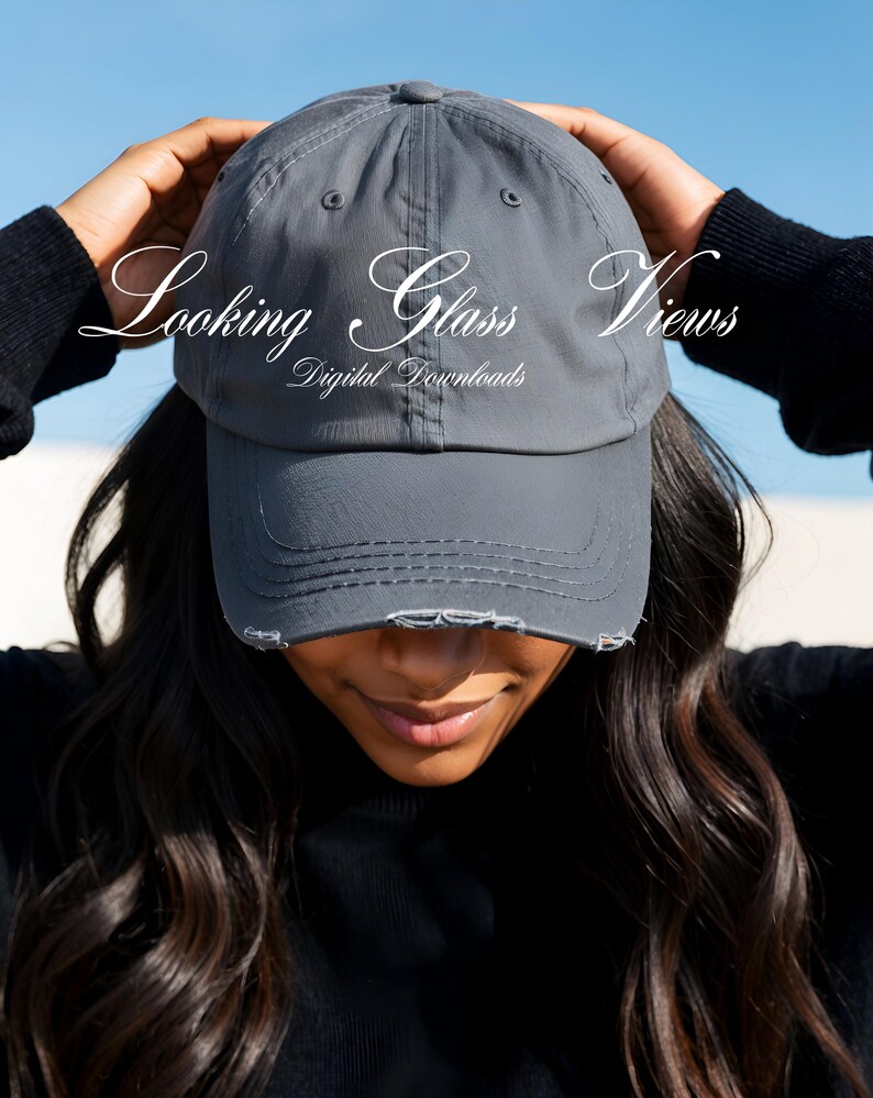 May include: A gray distressed baseball cap with the text "Looking Glass Views Digital Downloads" embroidered on the front.