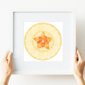 May include: A framed watercolor painting of a yellow and orange mandala with a flower in the center.