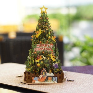Mini décoration de sapin de Noël | Sapin escamotable Joyeux Noël | Carte de voeux en bois avec arbre 3D amovible avec caisson lumineux.