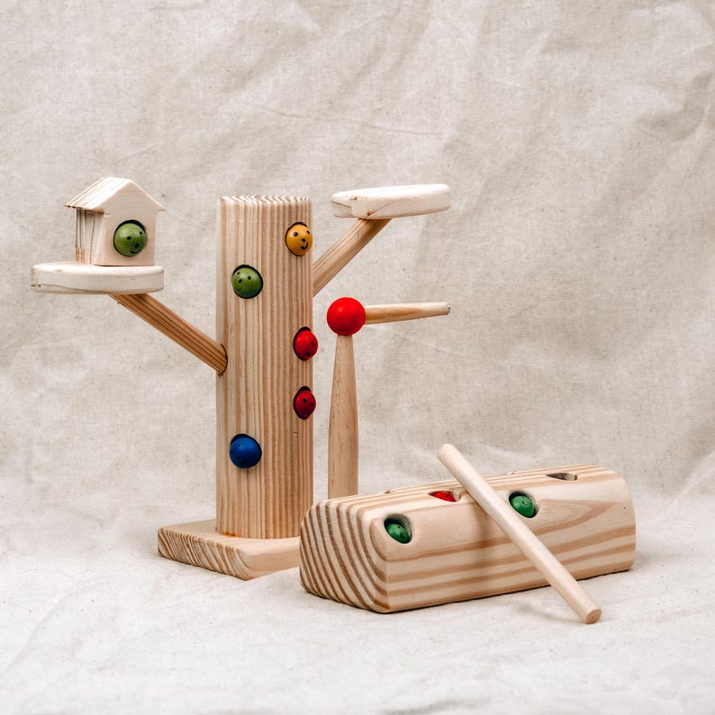Montessori wooden worm catcher toy set with tree stand, log block, magnetic stick, and colorful worms