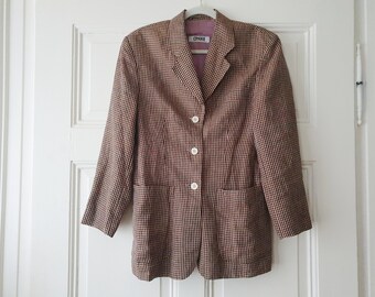 Authentic vintage blazer made of linen in size. S from the 1980s