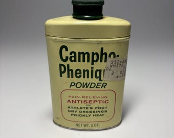 Lata de polvos Campho-Phenique vintage con contenido, 10 cm de alto.