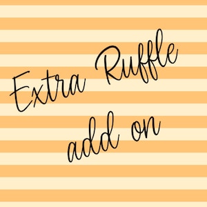 May include: Orange and white striped background with the text "Extra Ruffle add on" in black cursive font.