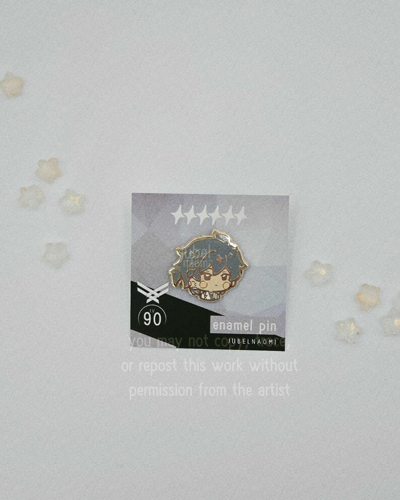 May include: A silver enamel pin featuring a cartoon character with blue hair and a small figure. The pin is on a gray card with text that reads "enamel pin" and "you may not copy or repost this work without permission from the artist."
