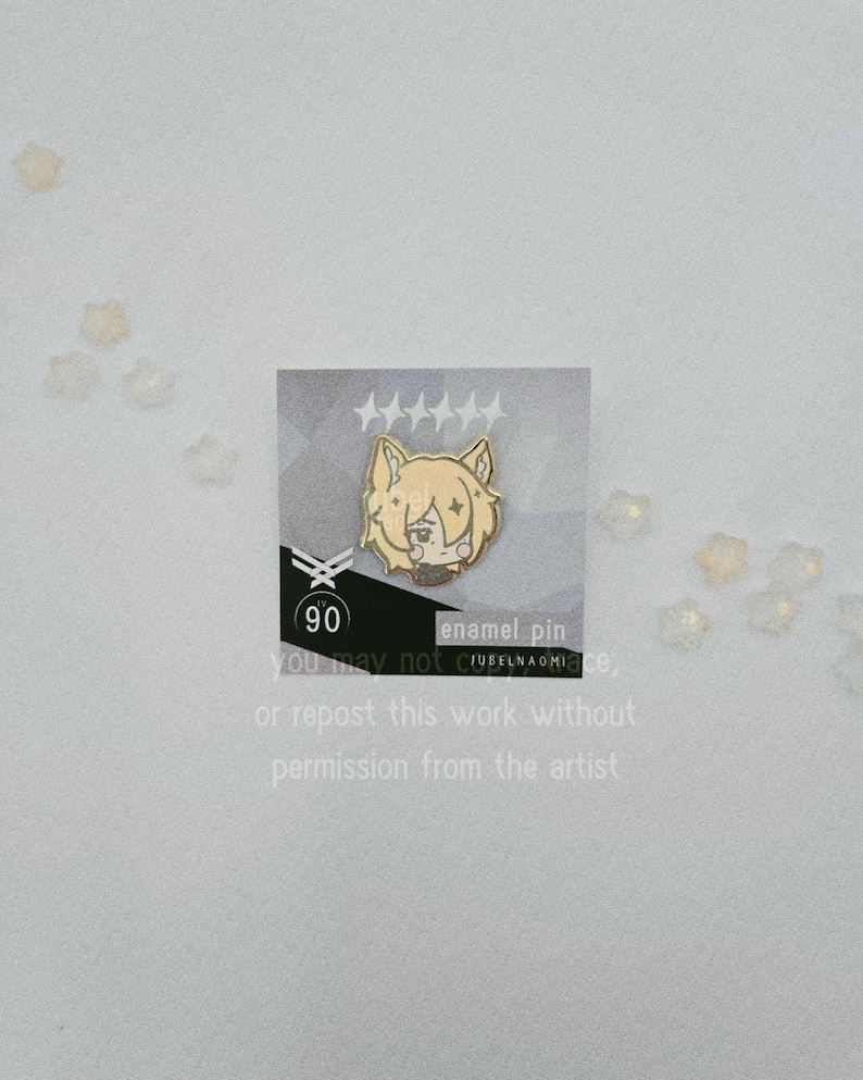 May include: A gold-colored enamel pin featuring a cartoon character with light brown hair and a black outfit. The pin is on a card with text that reads "enamel pin" and "you may not CUBELNAOMIace, or repost this work without permission from the artist."