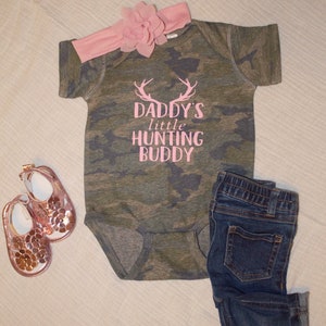 Daddy’s hunting buddy