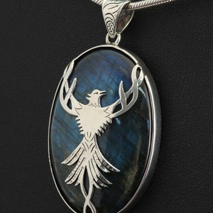 Phoenix on Labradorite, Handmade Sterling silver pendant featuring the Mythological Phoenix made into a beautiful pendant with Labradorite