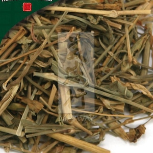 May include: Dried herbs in a pile, with a brown and green color scheme. The herbs are loose and appear to be stems and leaves. The text "PLUM FLOWER® Premier Quality - Chinese Herbs" is visible in the top left corner of the image.