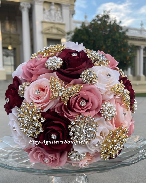Red Roses and Diamond Pins  Bridal bouquet, Floral event design, Beautiful  bouquet